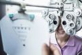 Woman getting eye exam